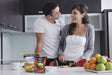 The Gripstic® Keeps Food Fresh Assorted Sizes Sealing Rods Couple in kitchen